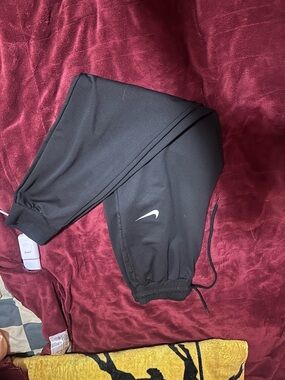 Nike Kids Black Jogger Pants with White Swoosh